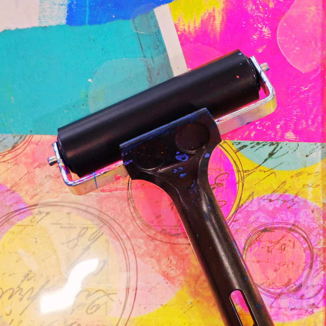 Black squeegee on a colorful abstract background