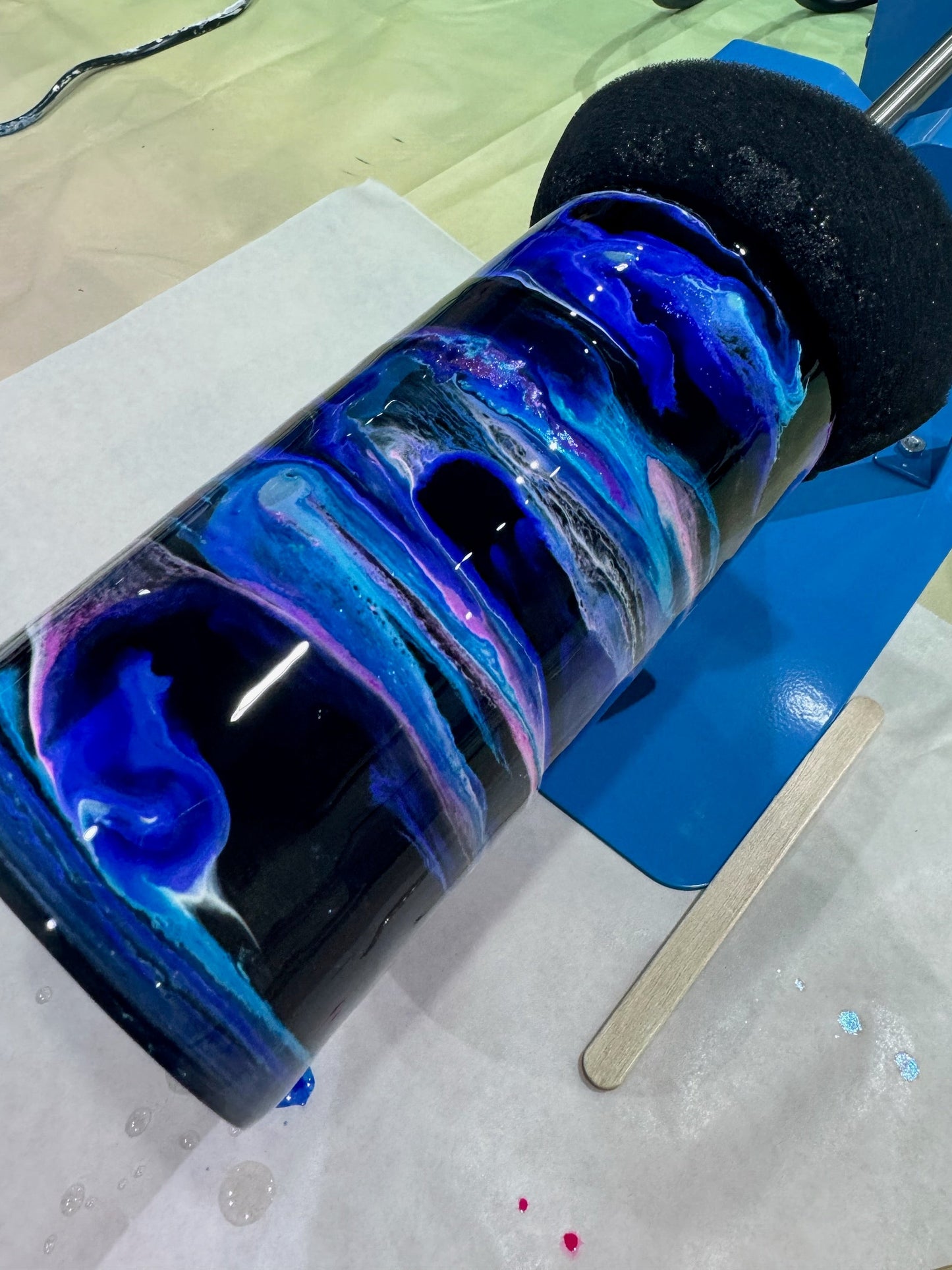 Colorful tumbler with a galaxy design on